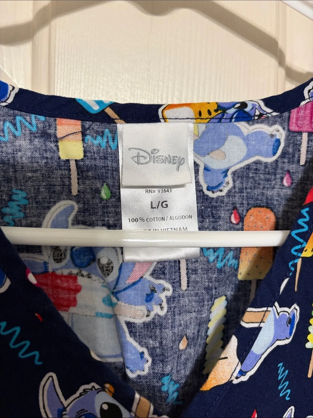 Disney Navy Blue Stitch Popsicle Print Scrub Top